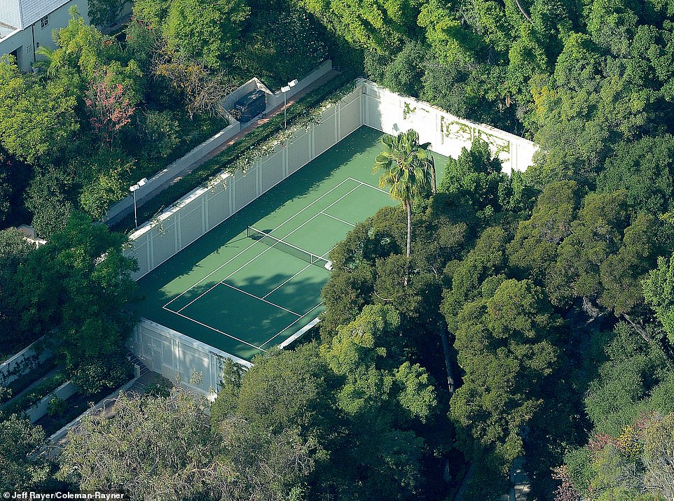 The home, which once belonged to legendary film producer Samuel Goldwyn, also has a large private tennis court