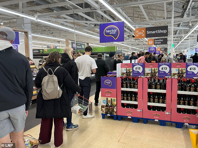 There are long queues at Sainsbury's in Wandsworth today as customers can only pay in cash as the overnight software update is affecting contactless payments and they are unable to deliver online orders.