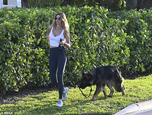 Tom Brady's ex-wife wore her long golden hair down with the waves flowing as she walked