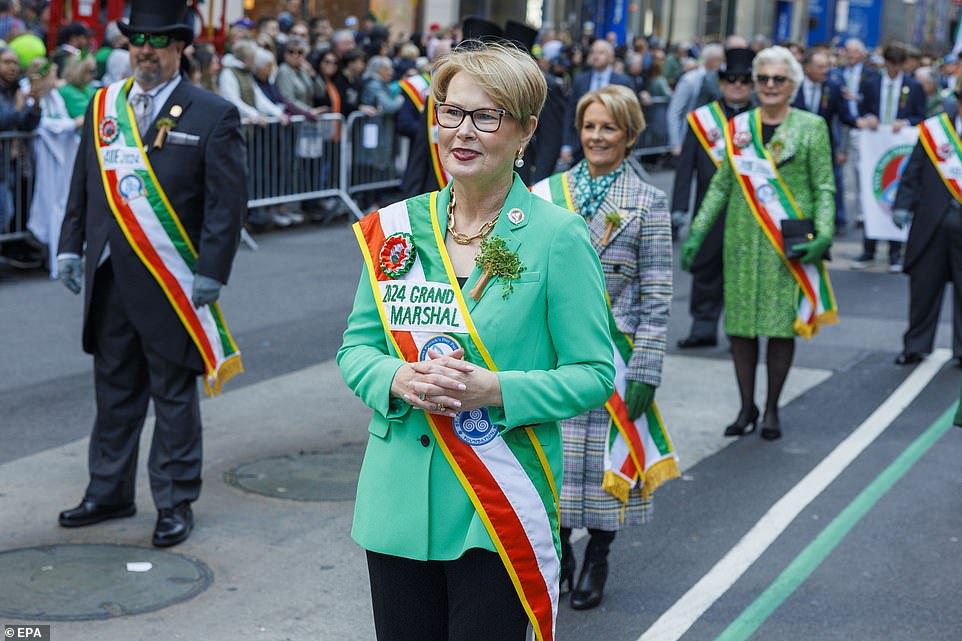 Many in the crowd wore green and waved Irish flags as they watched marching bands and other groups pass by, led by Grand Marshal Margaret Timoney (pictured), CEO of Heineken USA and Irish native