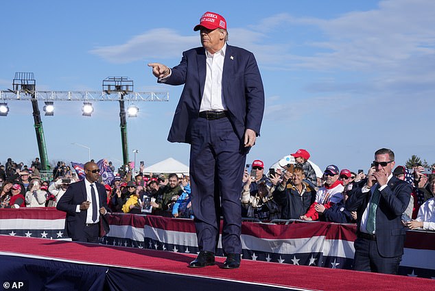 Trump, speaking at a windswept airfield outside Dayton on Saturday, drummed up support for his presidential campaign with Biden and his preferred Senate candidate Bernie Moreno