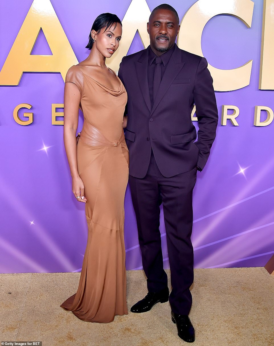 Idris Elba was the picture of suavity as he swaggered up a storm on the arm of his wife Sabrina, proving yet again why he's been dogged by James Bond casting rumors for years