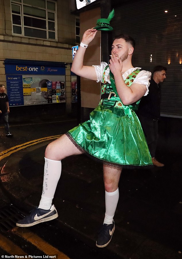 1710645436 167 Paint the town green Boozy revellers clad in shamrocks Guinness