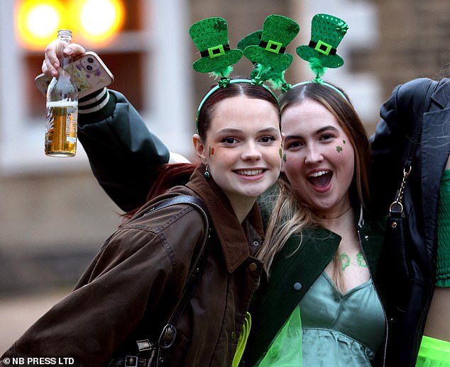 Pictured: Revelers kicked off St Patrick's Day celebrations earlier with a booze-filled night on the town