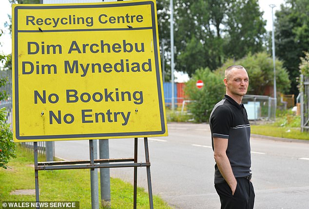 James pictured outside the recycling center in Newport, Gwent, Wales