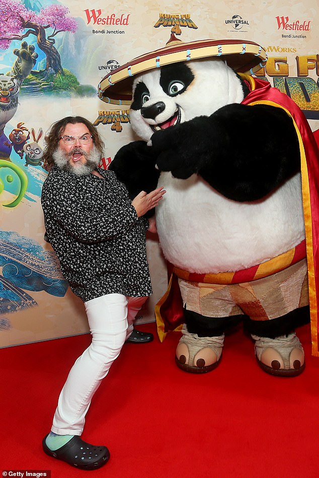 He looked to be having an absolute ball as he posed by the photo wall and showed off his Kung Fu moves