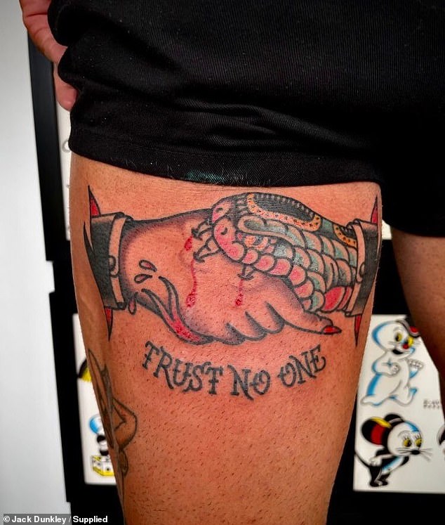 One of his most telling pieces is the 'trust no one' tattoo, accompanied by an image of a snake biting a hand, a stark reminder of a deal that fell through after his stint on the Channel Nine show