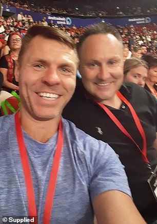 Mark Vaughan (pictured right at a Tony Robbins event) said he owes nearly $11,000 from Success Resources and urged them to 'practice what they preach'
