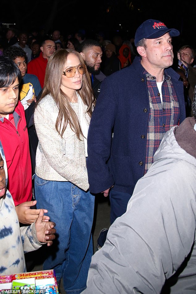 Lopez and Affleck were mobbed by fans as they left the arena with Samuel