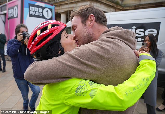 Emotional Mollie was met by fiance Stuart Broad as she completed her 500km Red Nose Day charity cycle ride on Friday