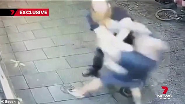 Two men are seen arguing outside the venue