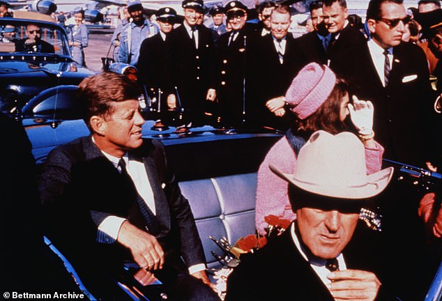 During the horrific shooting, JFK's blood spattered his clothes, but his grieving widow refused to take them off afterwards because she wanted his killers to 'see what they had done'