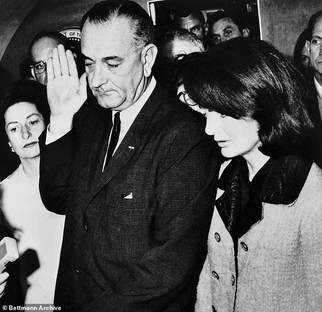 Jackie was seen wearing the bloody outfit hours later - when Lyndon B. Johnson was sworn in as president (seen)