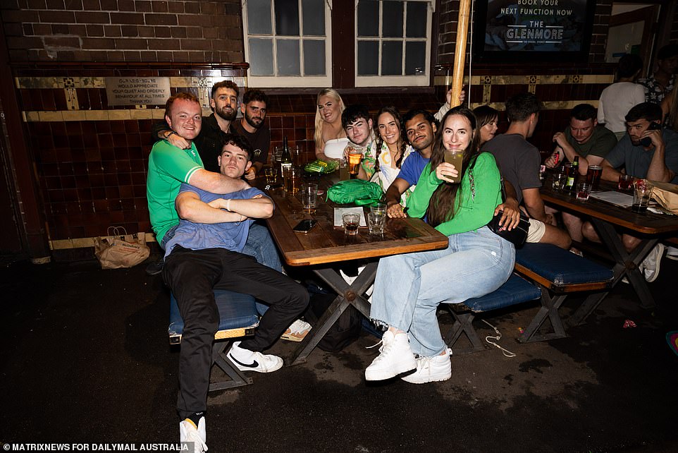 Revelers enjoyed Ireland's national holiday by sharing a drink with their friends