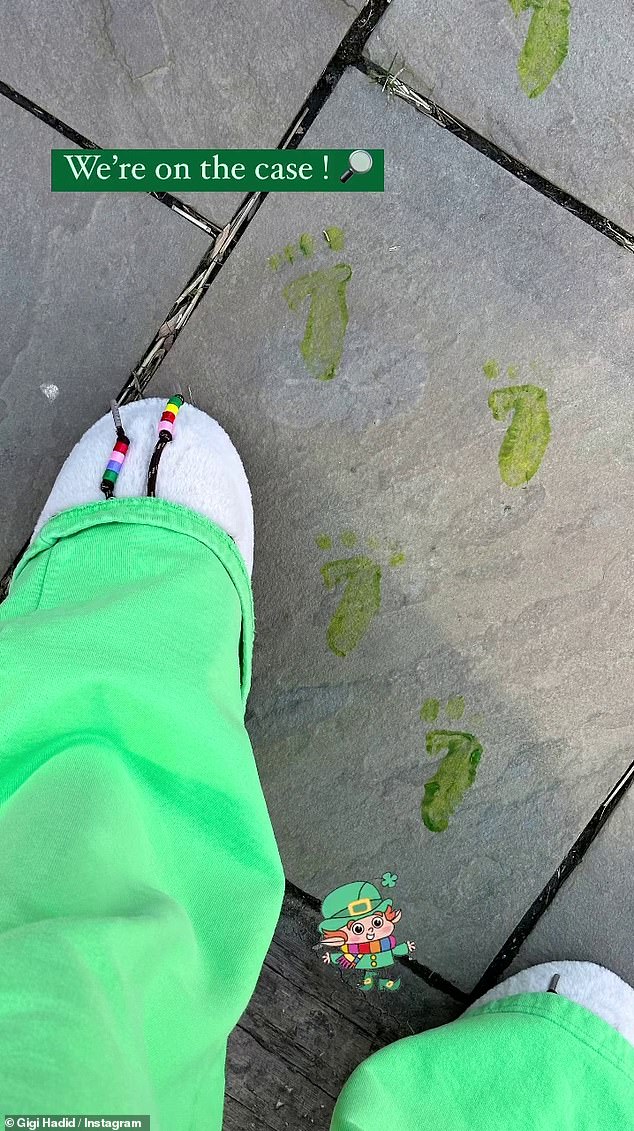 Gigi Hadid, 28, shared a sweet photo of daughter Khai's feet next to some small green footprints on the sidewalk. The three-year-old wore green pants and white slippers as she tried to find a leprechaun. 'We're on the case!' she wrote