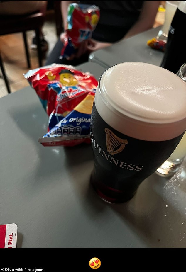 The actress also shares a throwback snap from a pub where she enjoyed a pint of Guinness and a bag of crisps