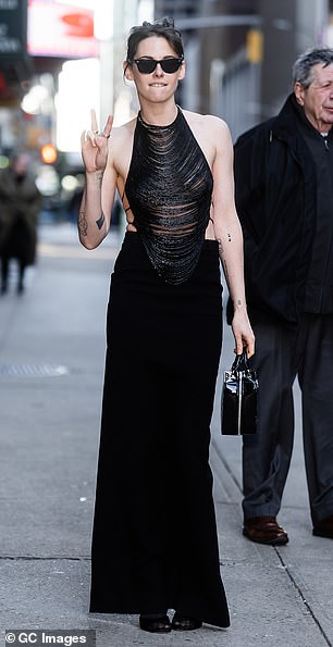 Kristen (pictured) set hearts racing in a barely-there outfit for her appearance on the Stephen Colbert Late Show to discuss the new crime-romance film