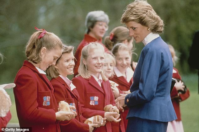 Although initially unhappy, she later settled into school and became a popular student, while dealing with the consequences of her family's breakup. Diana is pictured during a visit to the school in 1989