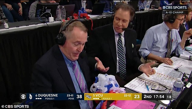 In the booth, the commentators had to clear their desks to be able to see their notes.
