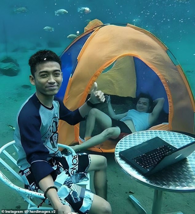 These two posed underwater to see them camping and working on a laptop.