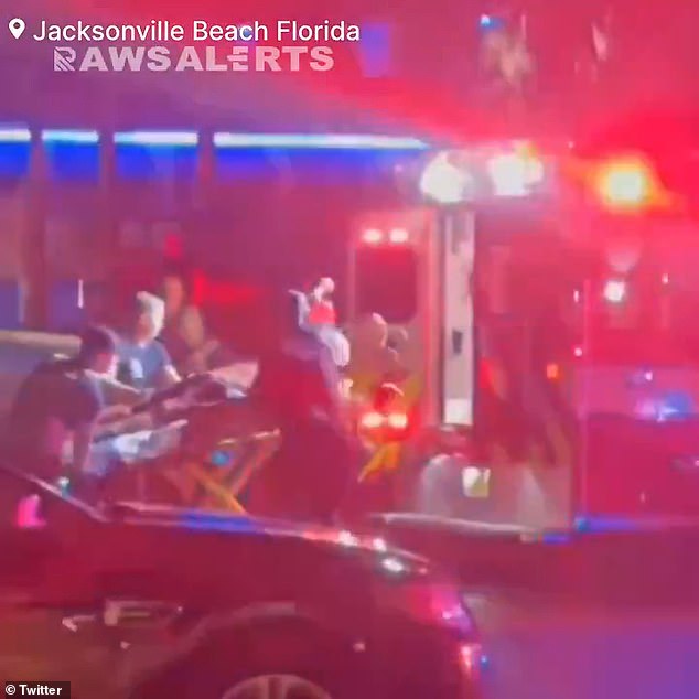 One of the three injured people could be seen being loaded into the back of an ambulance Sunday in downtown Jacksonville Beach.