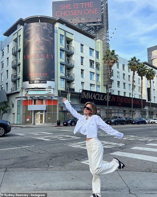 Sweeney also included a photo showing her posing in front of several promotional installations for the feature film that had been set up in Hollywood.