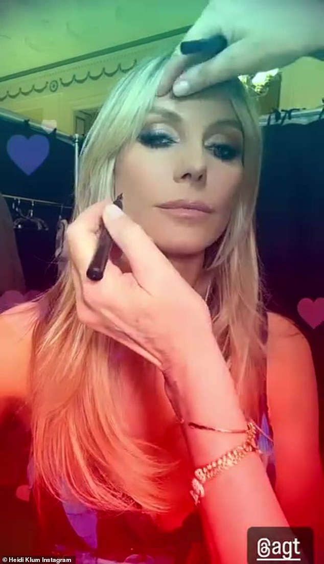 Shortly after, Klum shared a video of herself doing her makeup before meeting her colleagues and fans in the studio.