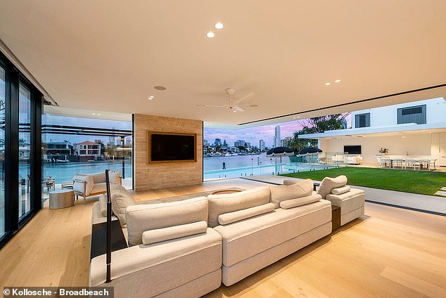 Created by renowned Gold Coast designer Jared Poole, the home boasts waterfront views and an impressive river position.