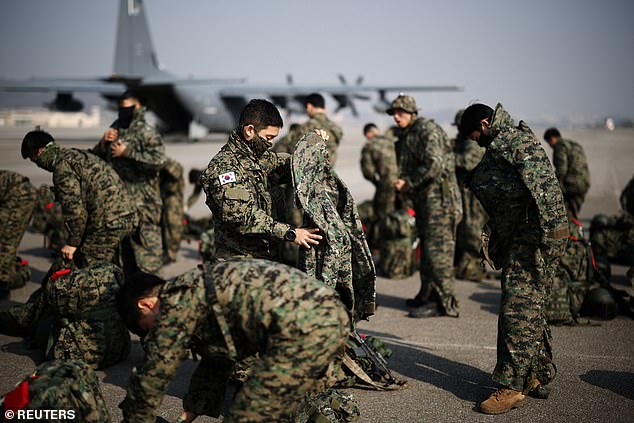 Members of the South Korean Army's Special Warfare Command prepare for their military training with the US Special Operations Command