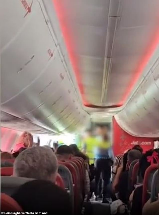 The passenger, who was allegedly under the influence of alcohol, was escorted off the plane by around five Portuguese officers.