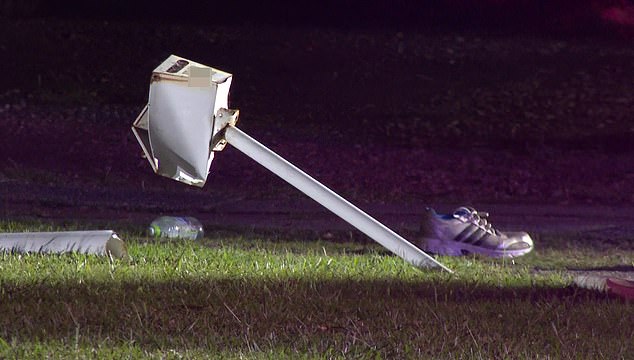 A mailbox was seen overturned at the scene of the accident Monday evening.