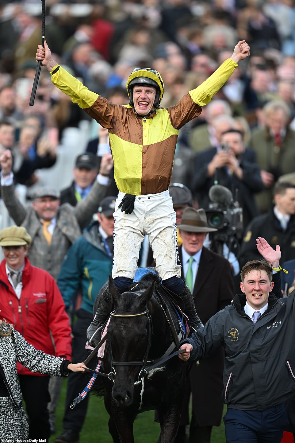 Notable jockey Paul Townend celebrates after winning the Gold Cup on Galopin Des Champs, who defended his title