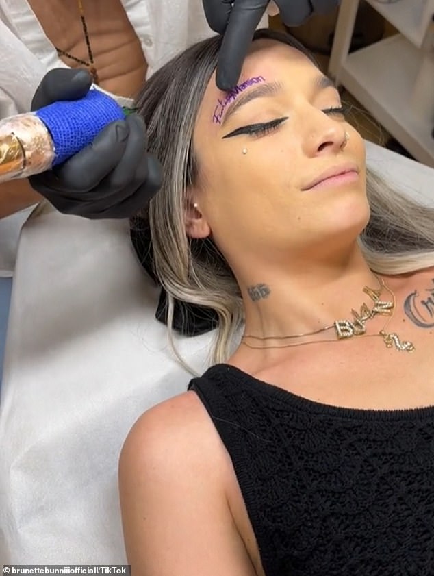 The brunette beauty shared a video with her 123,000 followers capturing her visit to a tattoo parlor. Jasmine looked focused as the tattoo artist carefully worked his magic and inked the company logo onto her face.