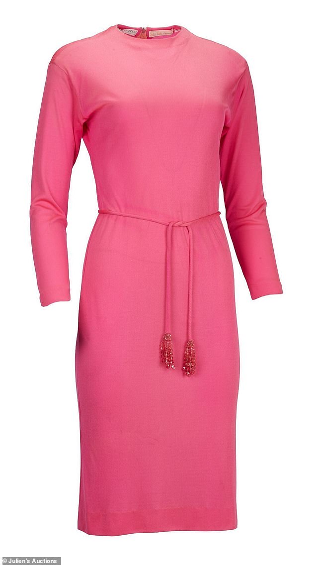 Pictured: Monroe's Pucci pink silk jersey dress with a rope and crystal tassel belt.