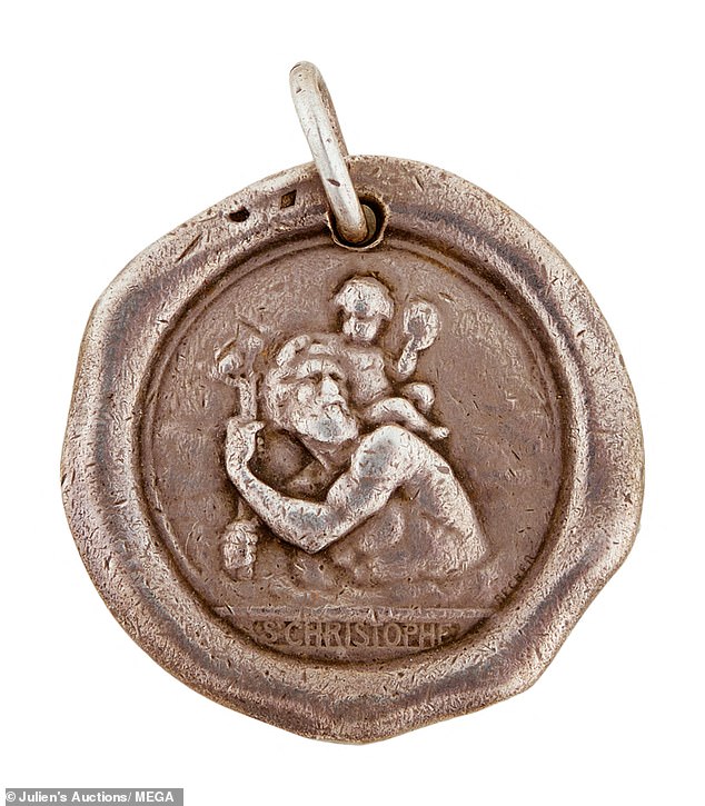 A religious medal of Saint Christopher that belonged to Monroe is one of the objects in the lot.