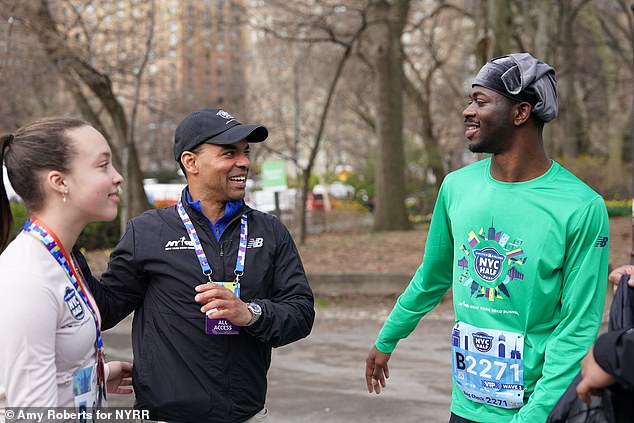 Nas donned a green New York Half Marathon shirt for the feat