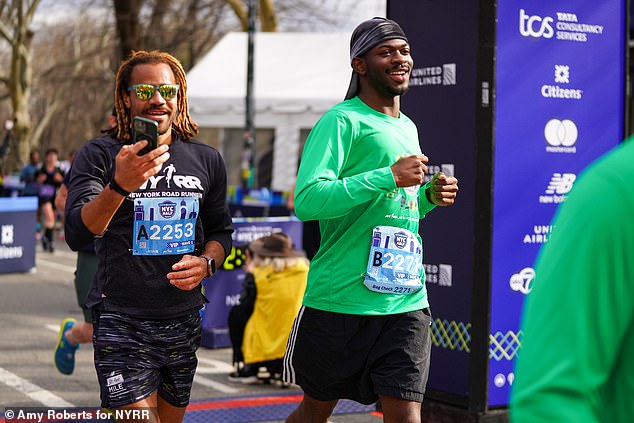 Nas flashed a smile as he crossed the finish line