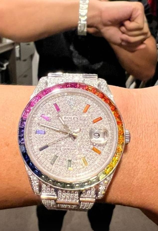 Among Mr. Escalante's many designer items is this diamond-encrusted Rolex