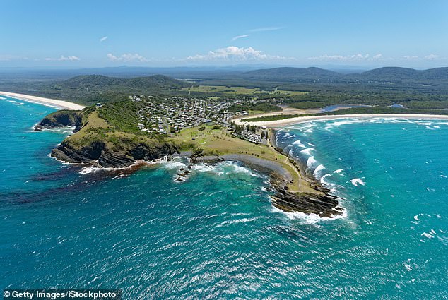 Haggett dove into the water at Killick Beach on the NSW mid north coast (pictured) to save the youngster - but almost lost his life.