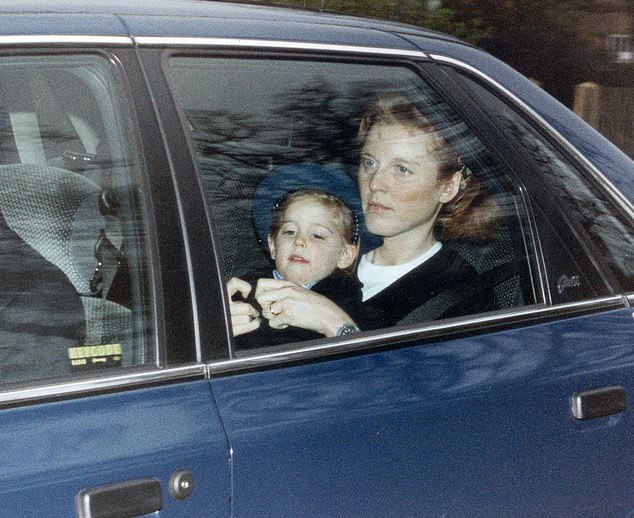 The Duchess pictured escorting young Princess Beatrice to Windsor School after the Yorks' separation was announced.