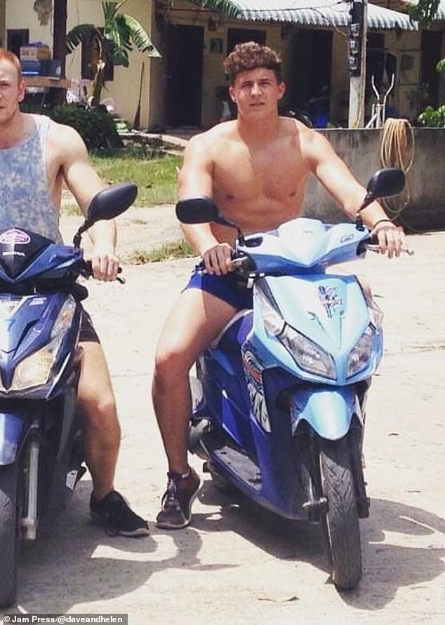 Dave pictured on a moped before the accident which left him paralyzed in Thailand in June 2015