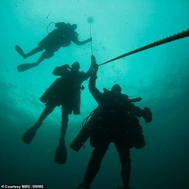 Teams of divers searched for the ship and an American company even appeared on the TV show Treasure Quest, but failed to find the treasure worth millions (pictured: Divers previously search for English treasure ship of the 17th century in the waters near the Isles of Scilly)