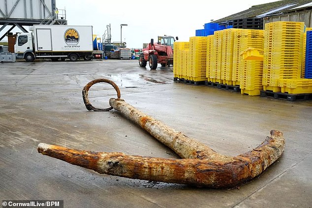 The rusty anchor is estimated to date back to between 1600 and 1800 and may have belonged to the Merchant Royal.