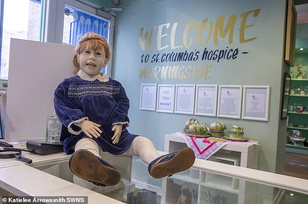 The doll began attracting attention on social media for scaring passersby as she peered through the window of the Edinburgh charity shop.