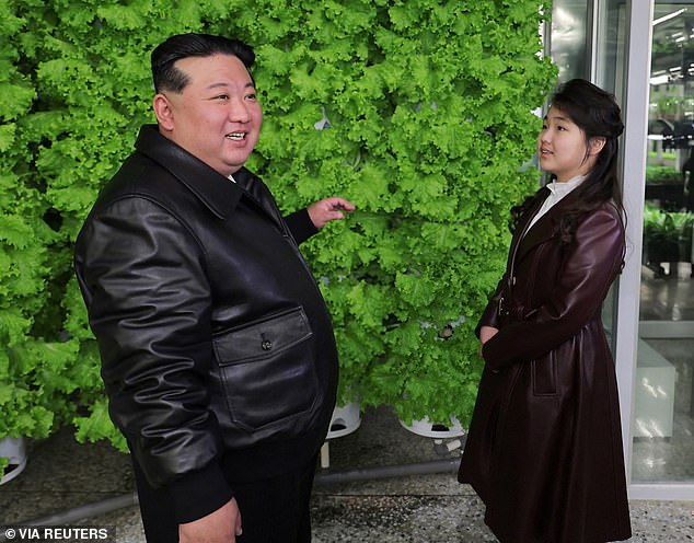 Kim Jong Un and his daughter Kim Ju Ae visit the Gangdong greenhouse in North Korea, in this photo released on March 16, 2024.