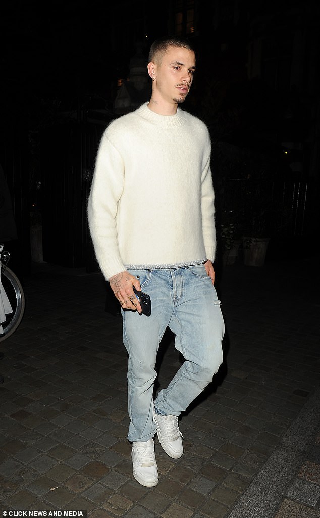Romeo completed his look for the outing with a pair of white sneakers