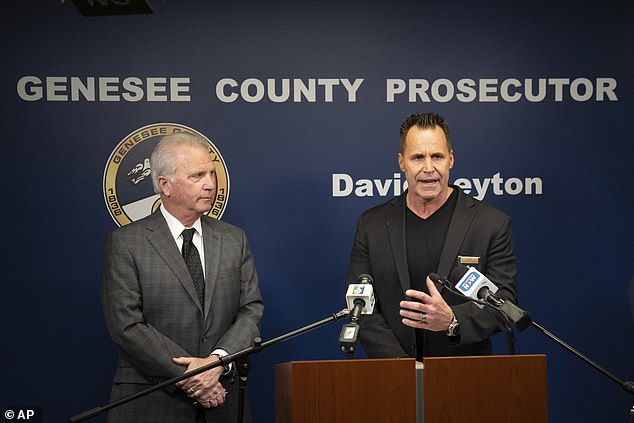Genesee County Sheriff Chris Swanson speaks alongside Genesee County Prosecutor David Leyton at a news conference Tuesday about the shooting.