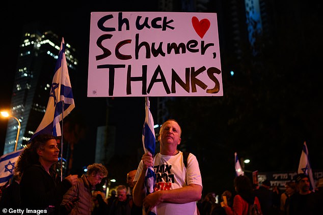 An Israeli protester seen Friday during a demonstration in Tel Aviv against the government and Israeli Prime Minister Benjamin Netanyahu