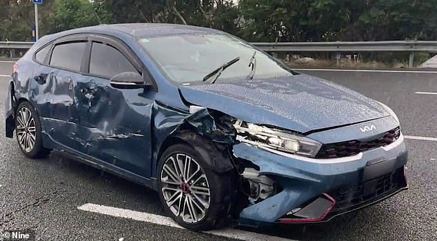 The woman said a number of drivers rolled down their windows and shouted abuse at her as her car was mangled in the middle of a busy highway (pictured).