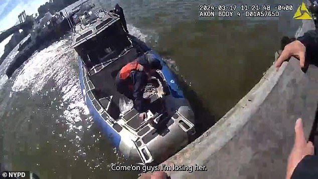 The boat stopped just in time beneath the teenager, much to the relief of the struggling police officers.